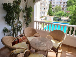 Nice and cozy flat with pool next to the beach